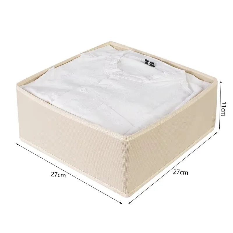 Beige foldable storage bin with fabric lid for neatly folded clothing