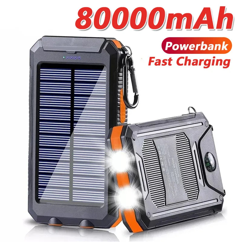 Rugged solar power bank with dual LED lights, dark gray and orange body, carabiner strap