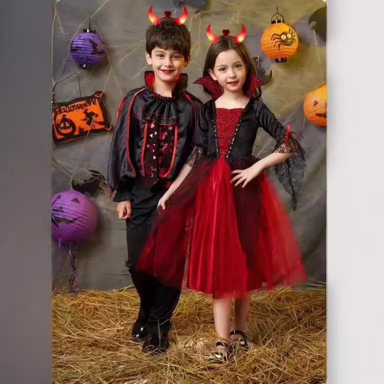 Kids Halloween costume set: boy in black with red trim and girl in black-and-red dress