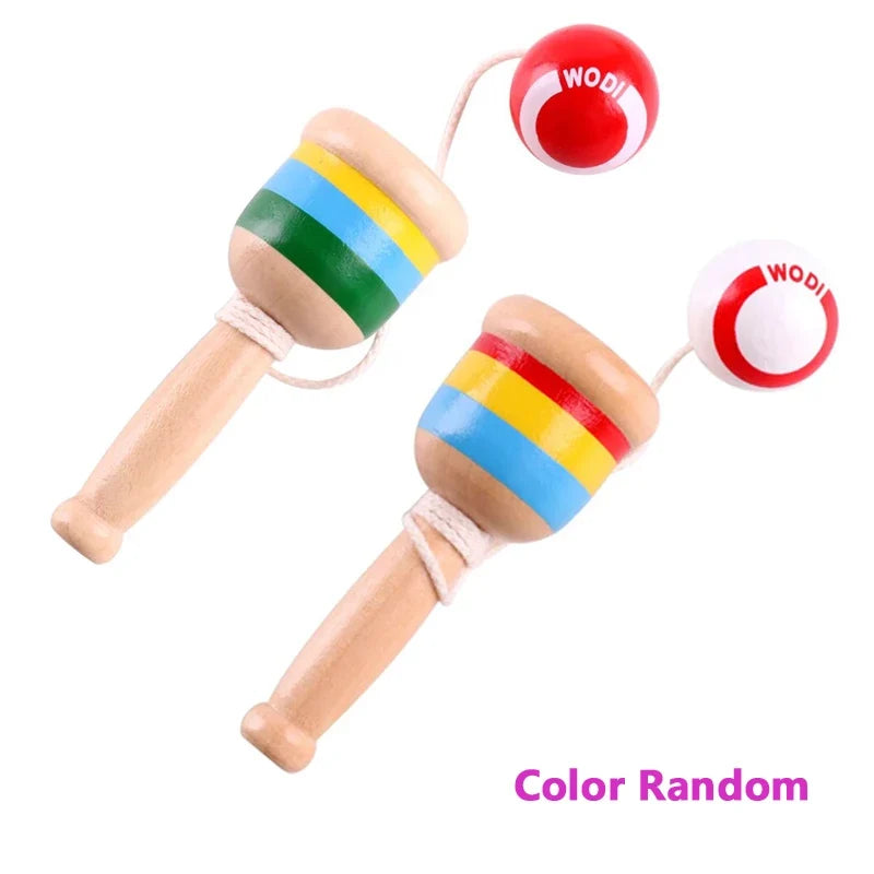 Two wooden cup-and-ball handles with rainbow rings and red ball cups on strings