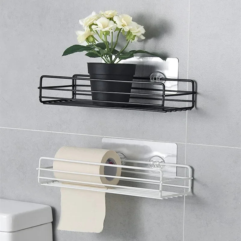 White metal two-tier wall shelf organizer with flower vase, toilet paper, and toiletries
