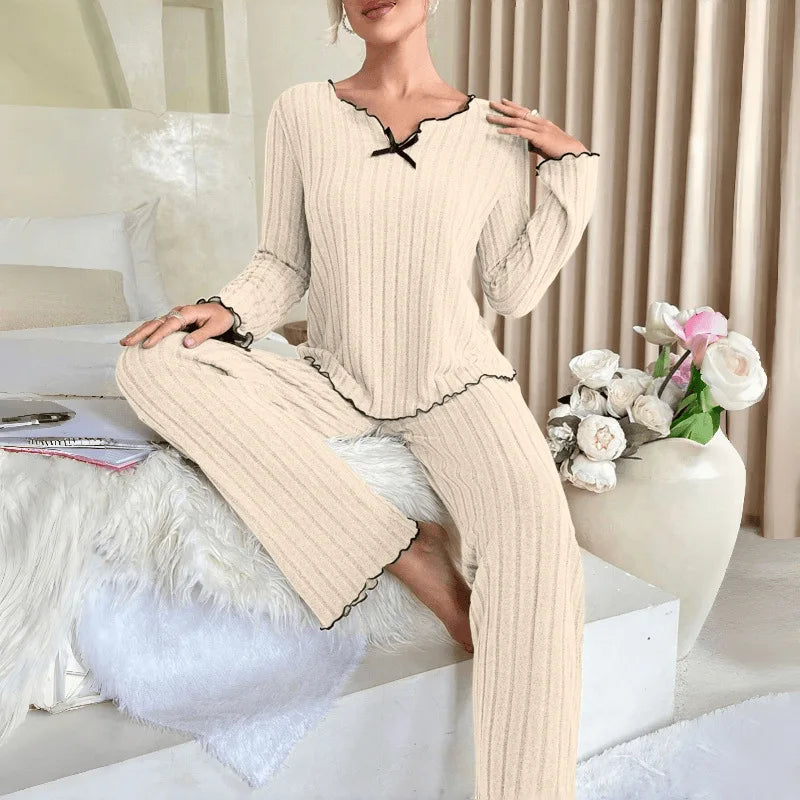 Women’s long-sleeve pajama set in cream rib knit with scallop-trim crew neck and pants