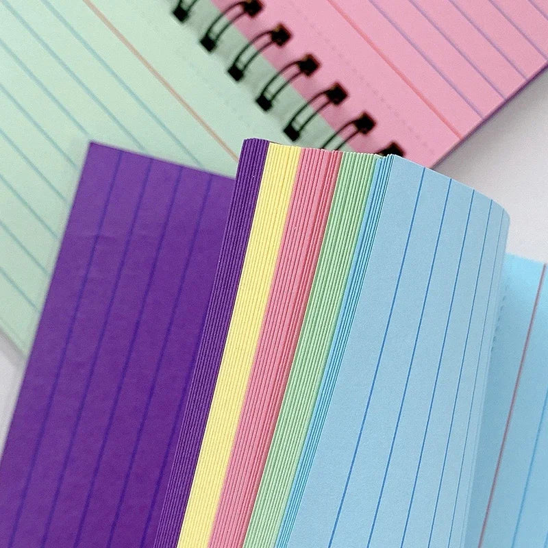 A5 lined spiral notebook with rainbow striped pages