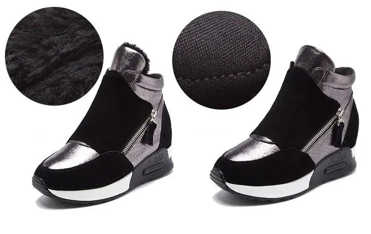 Black ankle boots with faux fur collar, silver side panels, and side zipper