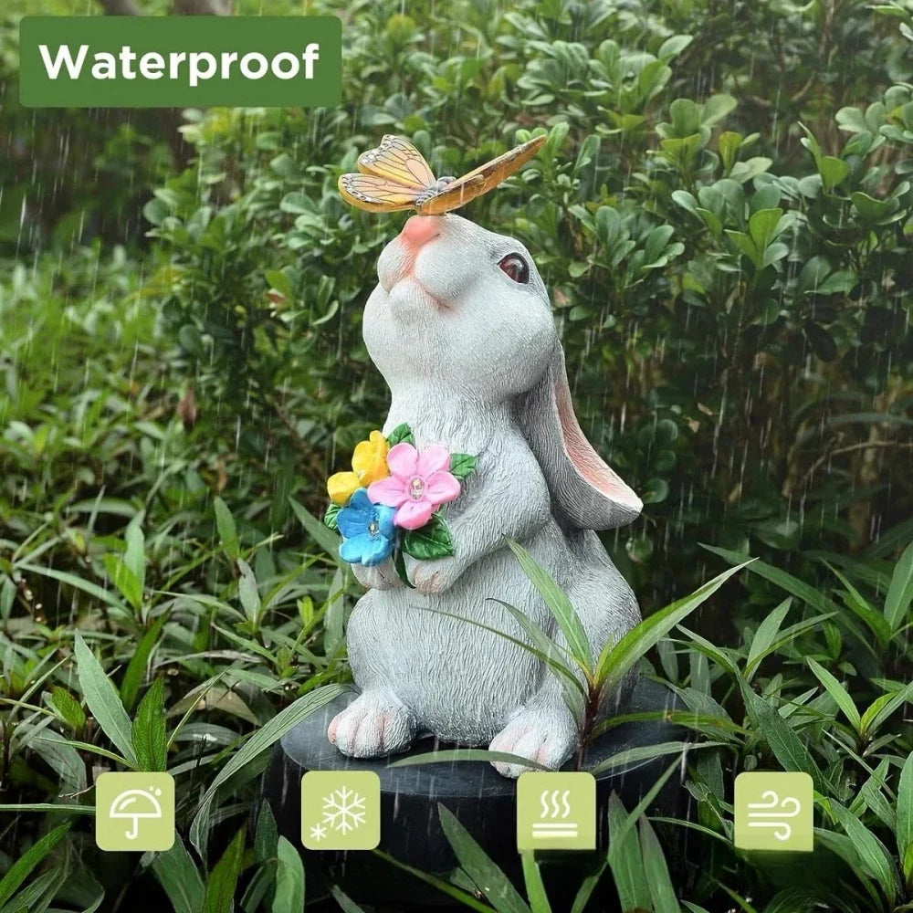 Outdoor rabbit statue with butterfly LED light and multicolor flower bouquet