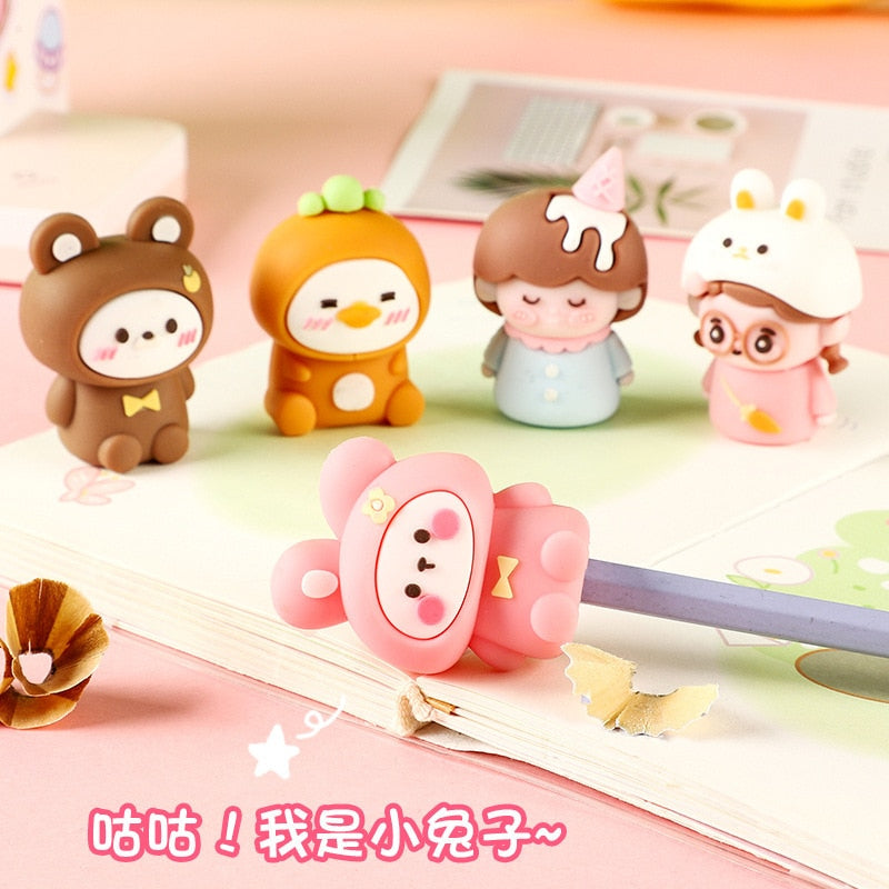 Row of animal pencil sharpeners: bear, carrot, and two other bunny-like figures.