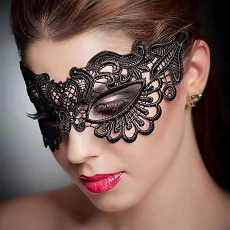 Black lace masquerade eye mask with large leaf-and-swirl eye centerpiece