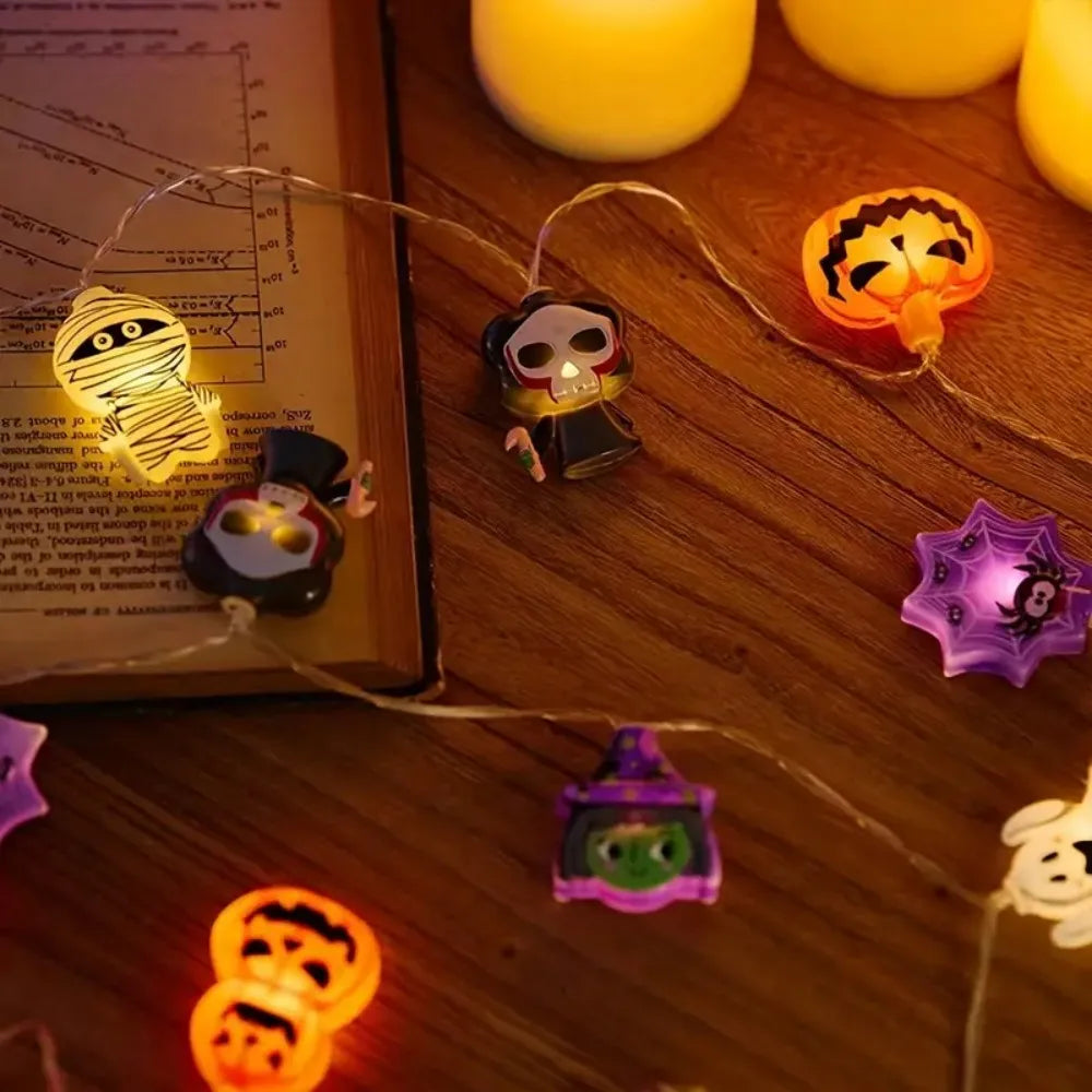 Halloween LED light string with glowing jack-o’-lantern, ghost, and zombie character bulbs