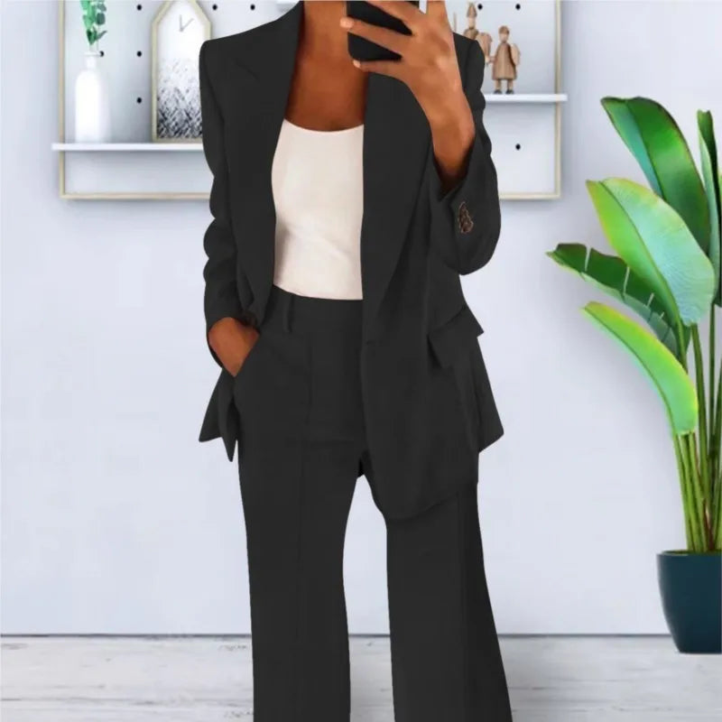 Black two-piece blazer and trousers set, long sleeves, flap pockets, high-waist fit