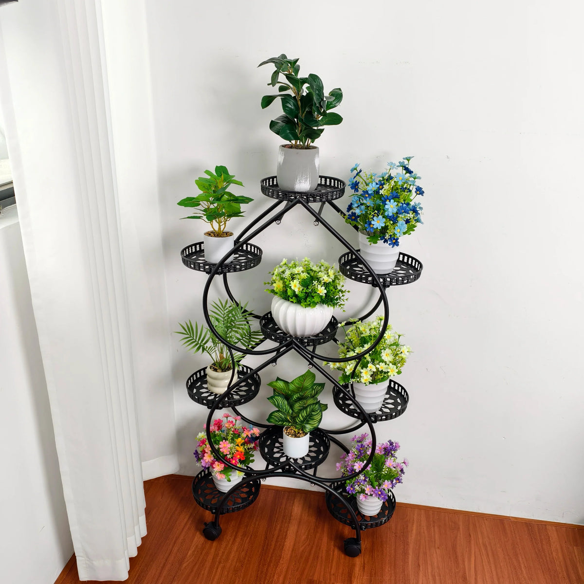 Black iron 9-pot rolling plant stand showing circular tray levels with caster wheels
