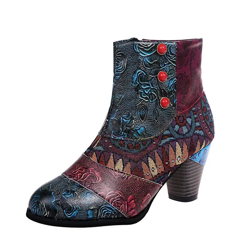Women’s ankle boots with dark floral folk print, textured upper, and chunky stacked heel