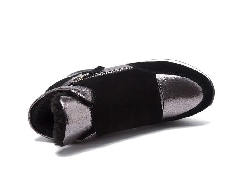 Black and silver ankle boot with faux fur lining and open cuff