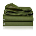 Green tarpaulin cover with rolled fabric and metal grommets, bundled with straps