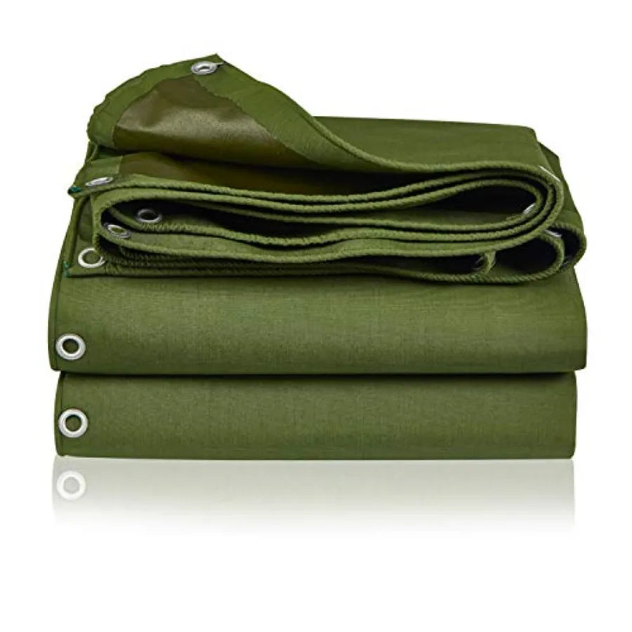 Green tarpaulin cover with rolled fabric and metal grommets, bundled with straps