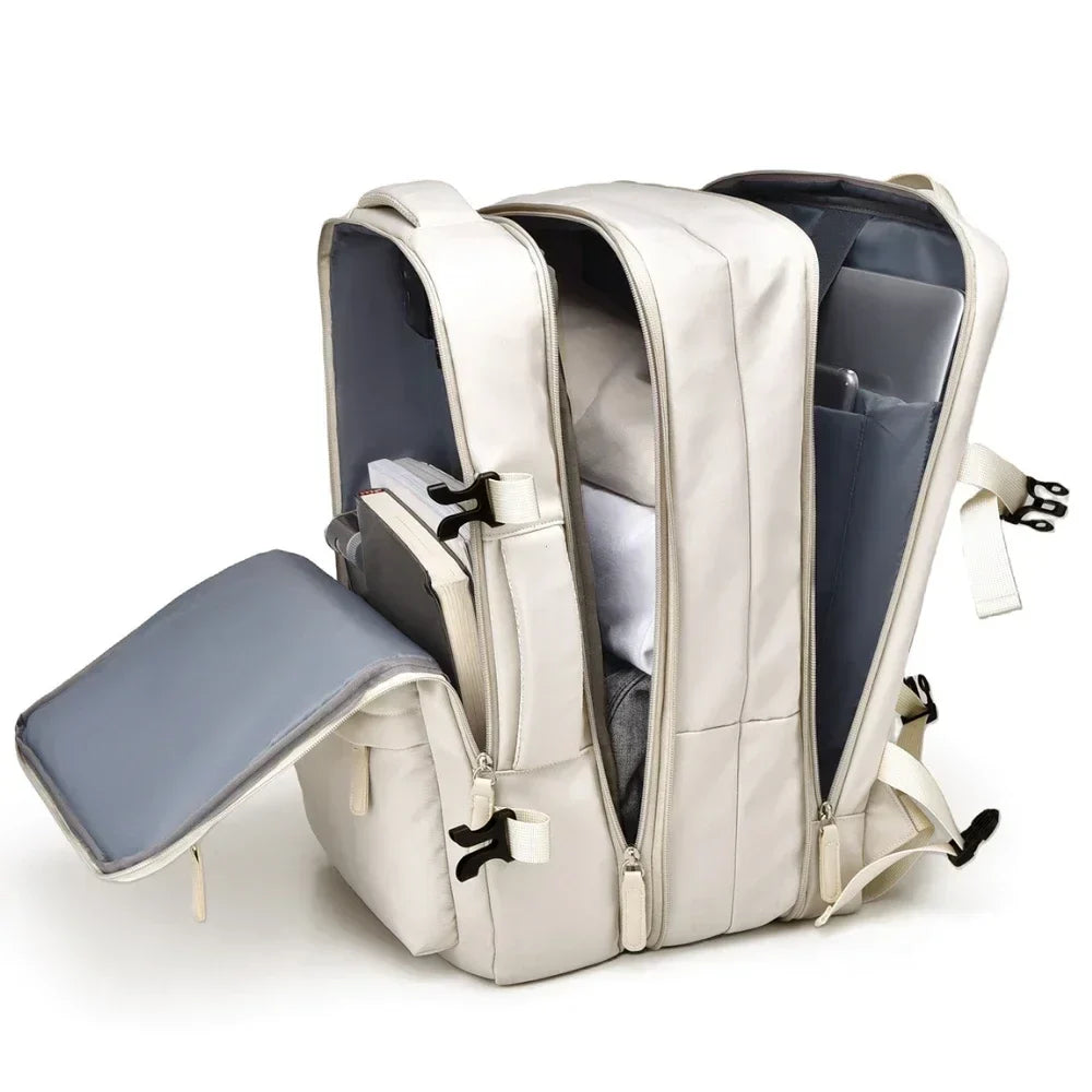 White backpack with side compartment and open front flap, showing interior padding