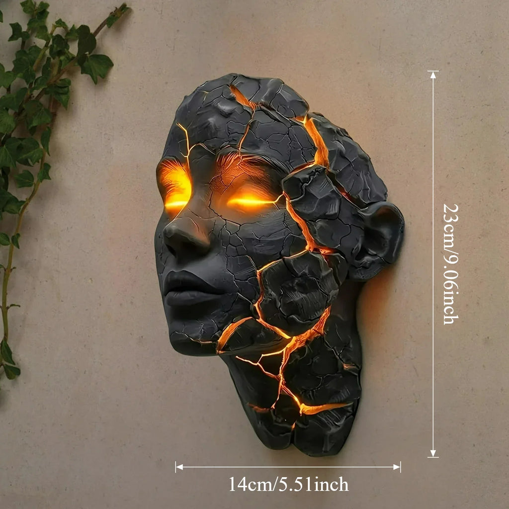 Black cracked-face resin wall lamp figurine, glowing orange fissures, size shown