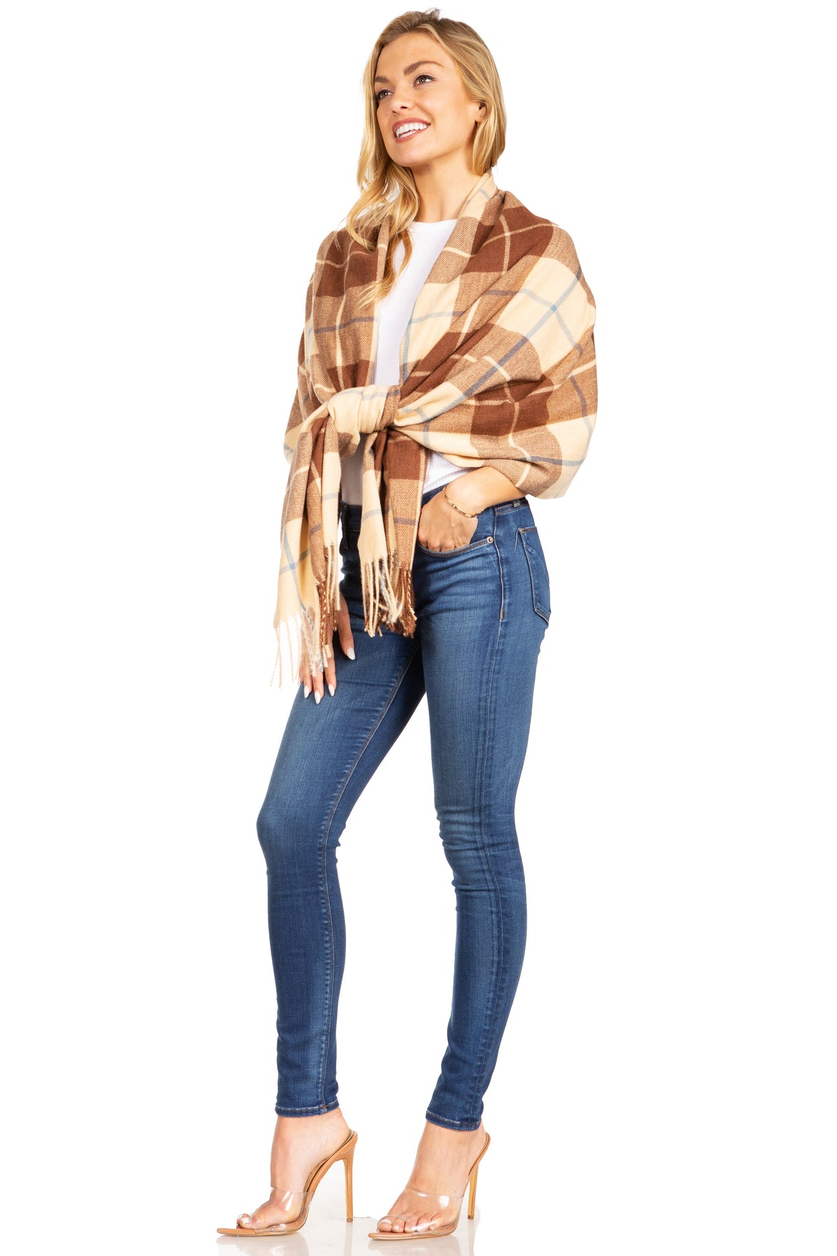 Plaid pashmina shawl wrap in brown and tan with fringed edges, tied at the front