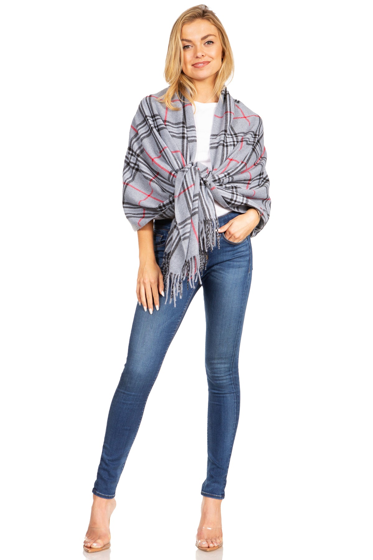 Plaid pashmina shawl in gray with red lines, front drape with tied knot and fringe