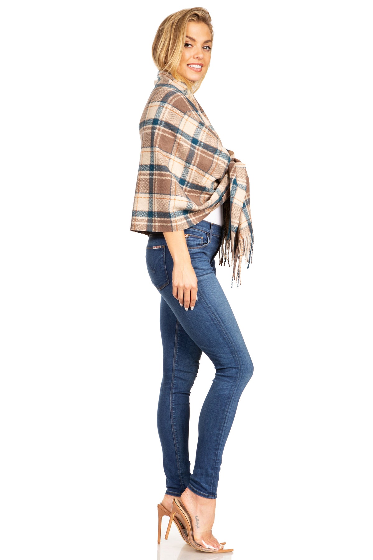 Camel plaid pashmina shawl wrap scarf with fringe trim, side view over jeans