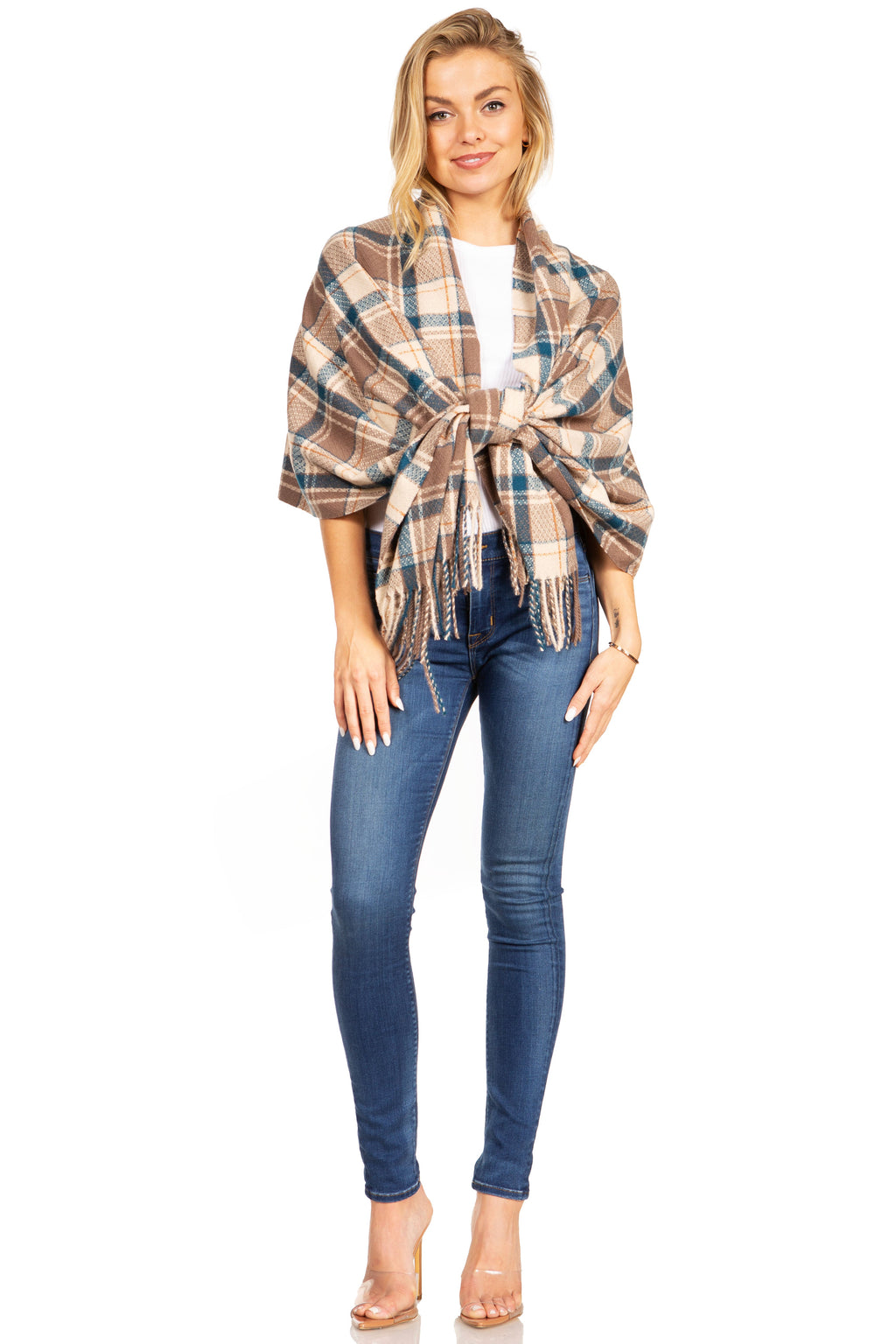 Camel plaid pashmina shawl wrap scarf with fringed trim, front view over jeans