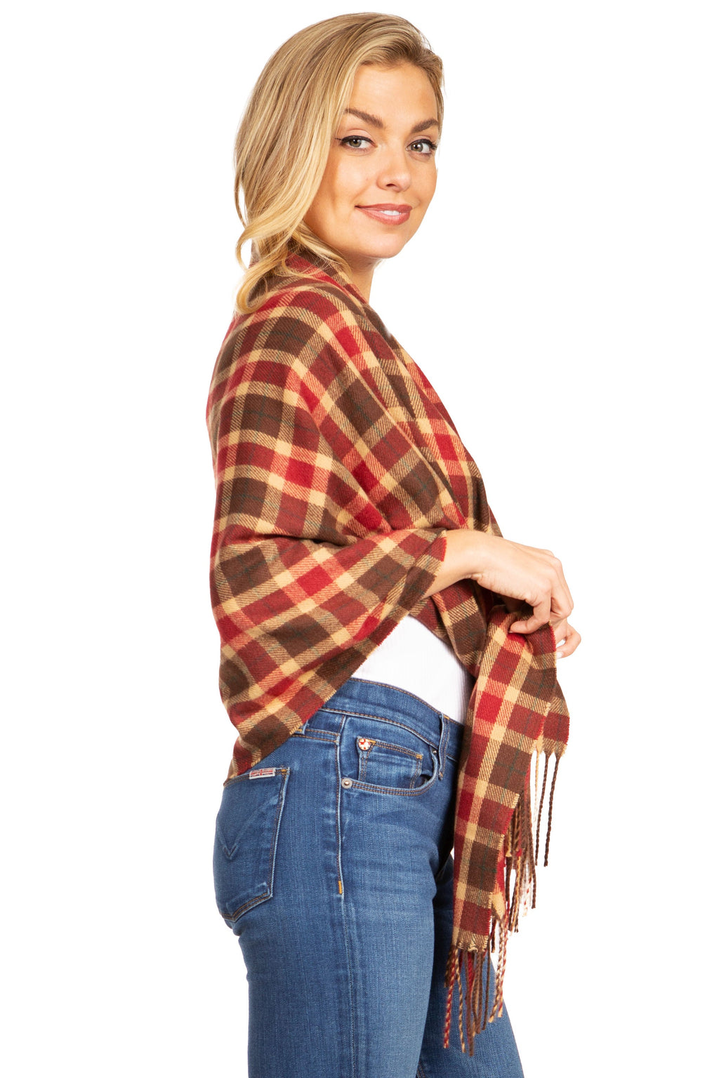 Red and brown plaid pashmina-style shawl with fringe, angled over shoulder