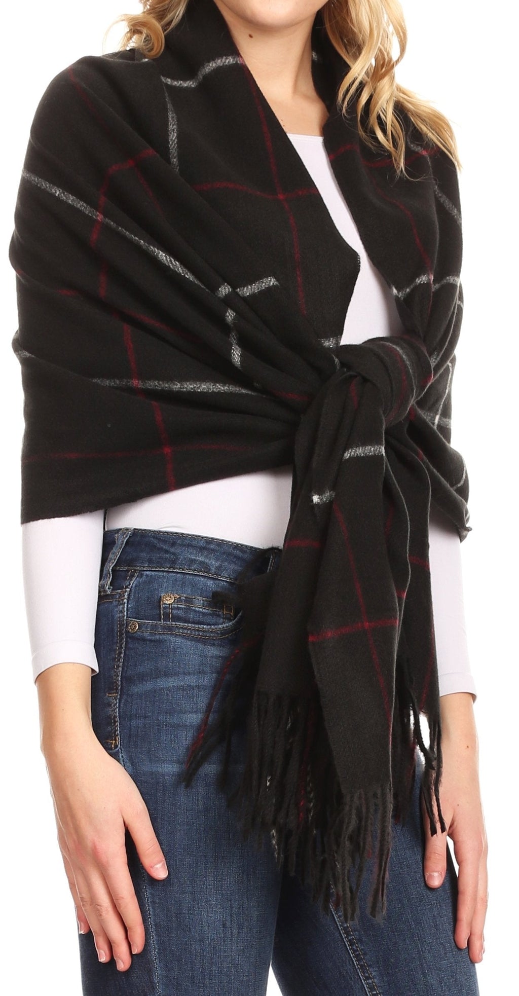 Black plaid pashmina shawl with fringed ends and red-gray check pattern, tied at front