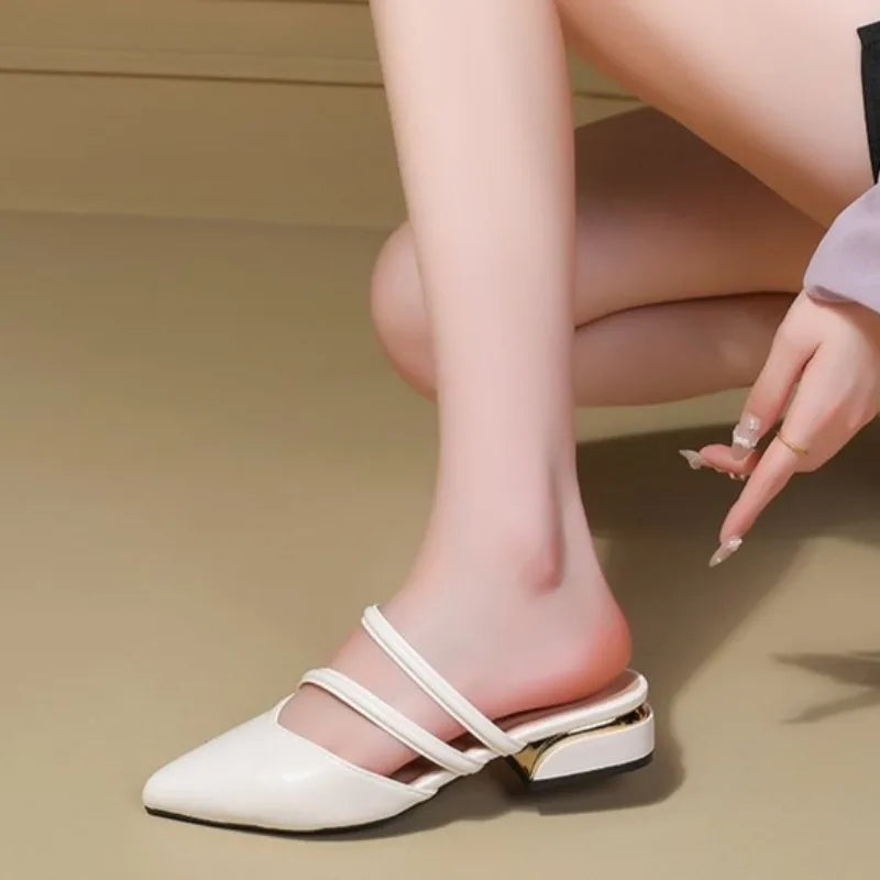 Women’s white pointed-toe low-heel sandals with two straps across the foot
