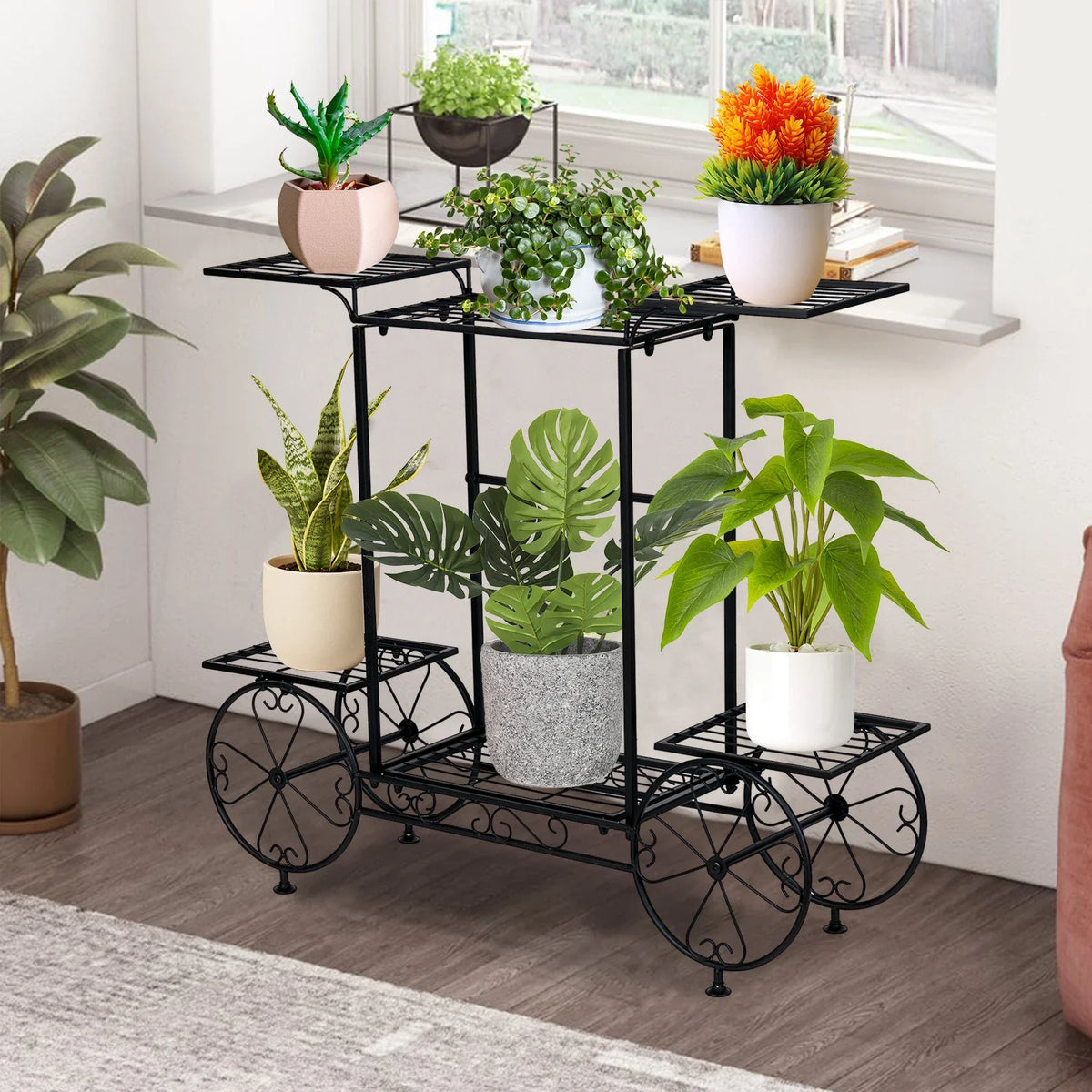 Black rolling plant display rack with grid shelves and curved wheel base
