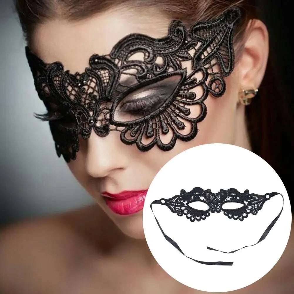 Black lace eye mask close-up with intricate filigree and lace edging