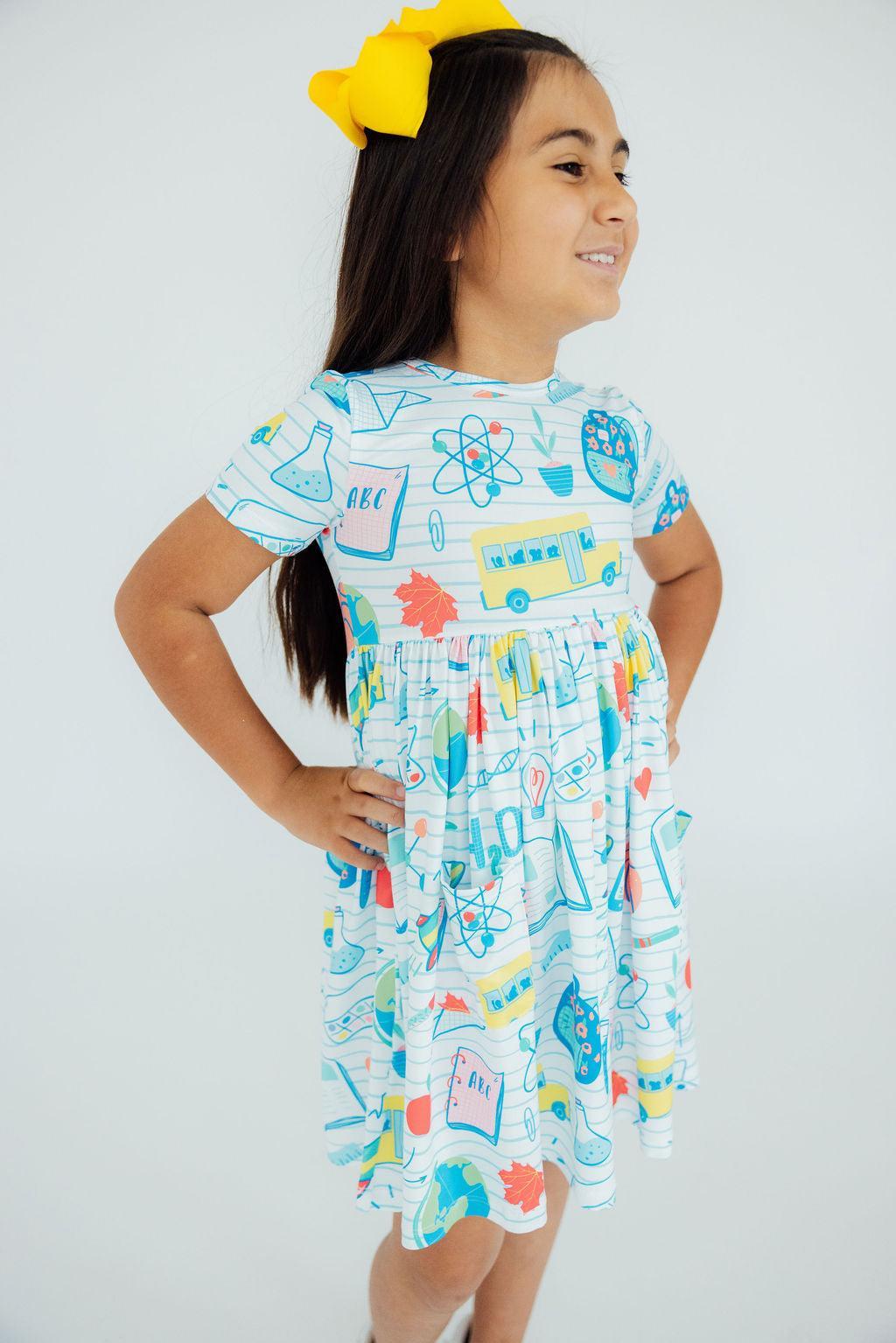 Girls' light blue science-print twirl dress with gathered waist and skirt