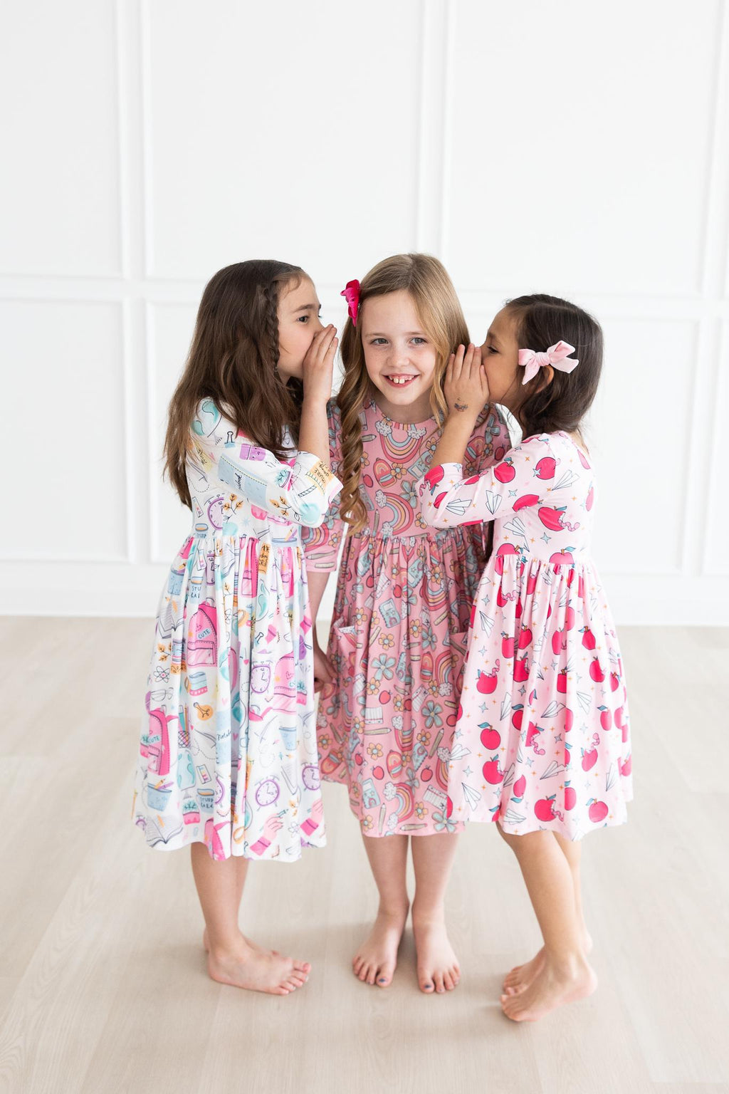 Girls' white 3/4-sleeve printed twirl dress with flared hem and gathered design