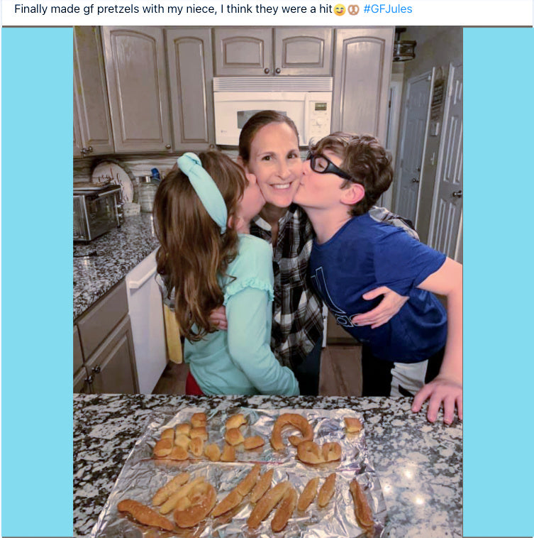 Gluten-free flour pretzels on baking sheet with dough pieces