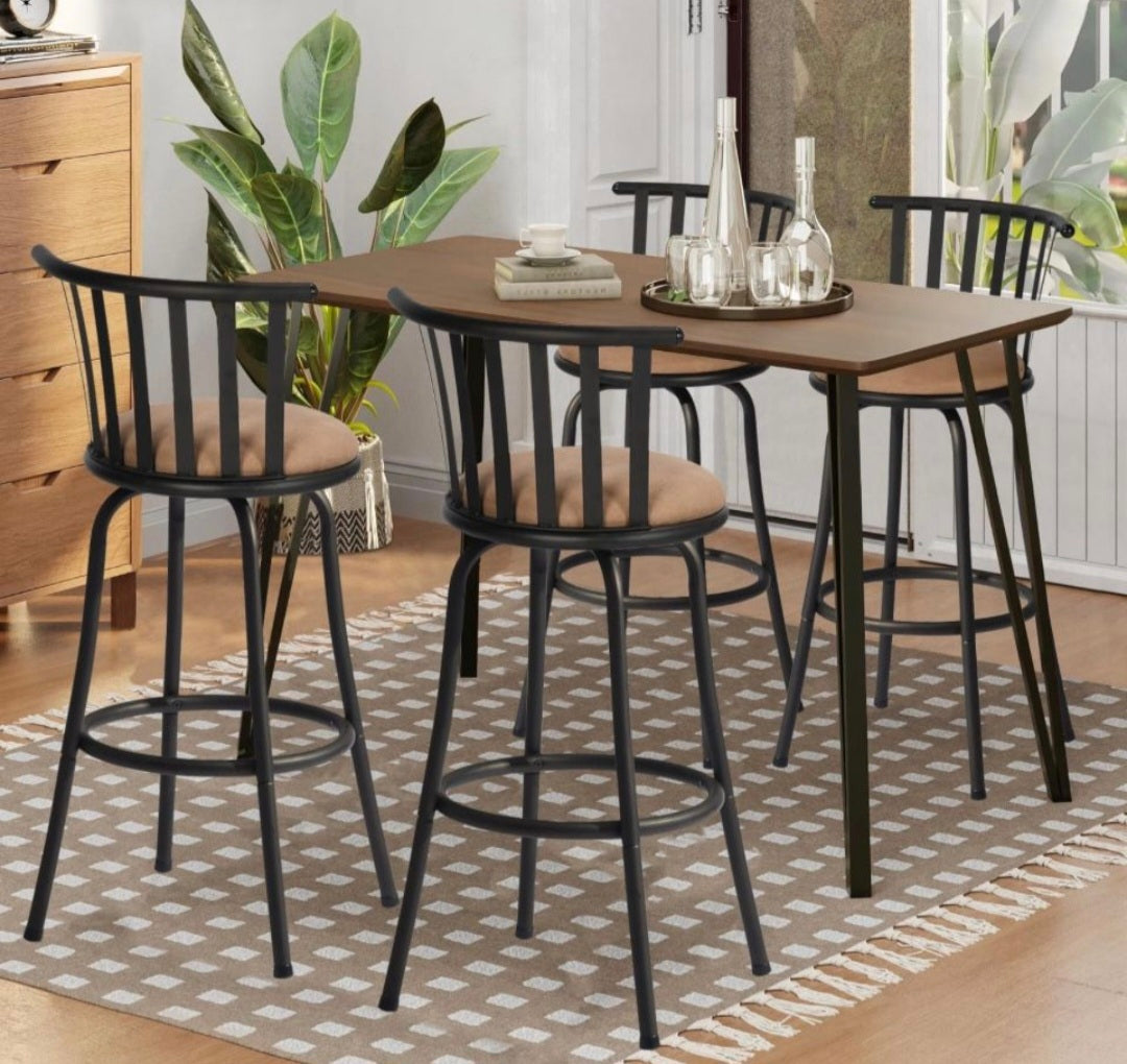 Set of counter-height barstools with slatted backs, round cushioned tan seats, and black footrests.