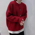Wine red knit button-front cardigan with ribbed cuffs and dark buttons