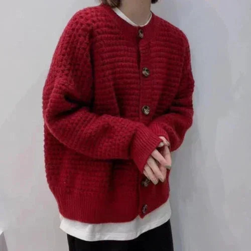 Wine red knit button-front cardigan with ribbed cuffs and dark buttons