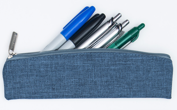 Blue fabric pencil pouch with zip top, with pens visible on top.