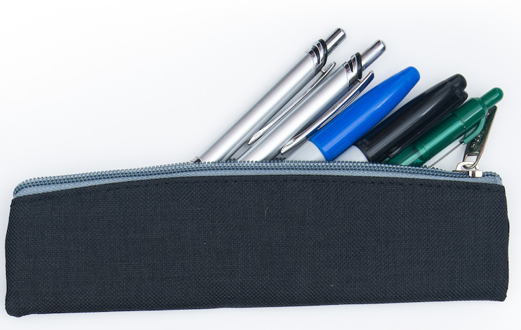 Navy fabric pencil pouch with zip top, holding multiple pens.