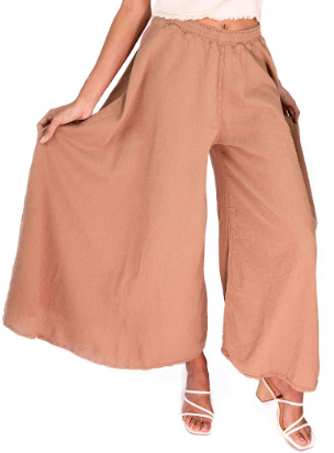 Tan 100% cotton gauze pants with elastic waist and wide, flowing legs