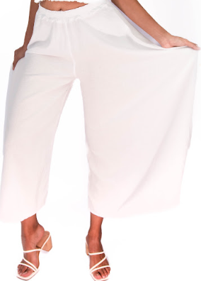White 100% cotton gauze pants with elastic waist and loose wide-leg cut