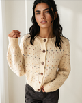 Cream speckled button-front knit cardigan with long sleeves
