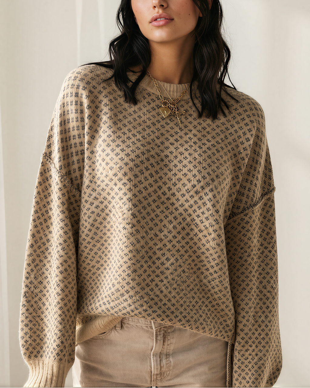 Beige geometric drop-shoulder knit pullover with ribbed cuffs and hem