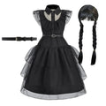 Black princess costume dress for kids with puff sleeves, belt, and layered tulle skirt