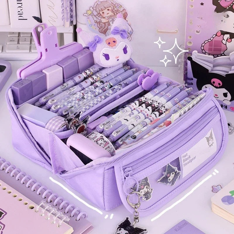 Purple zip pencil case with open compartments and cartoon keychain charm