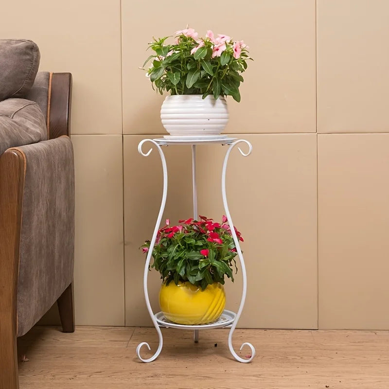 White two-tier flower plant stand with scroll legs supporting two potted plants