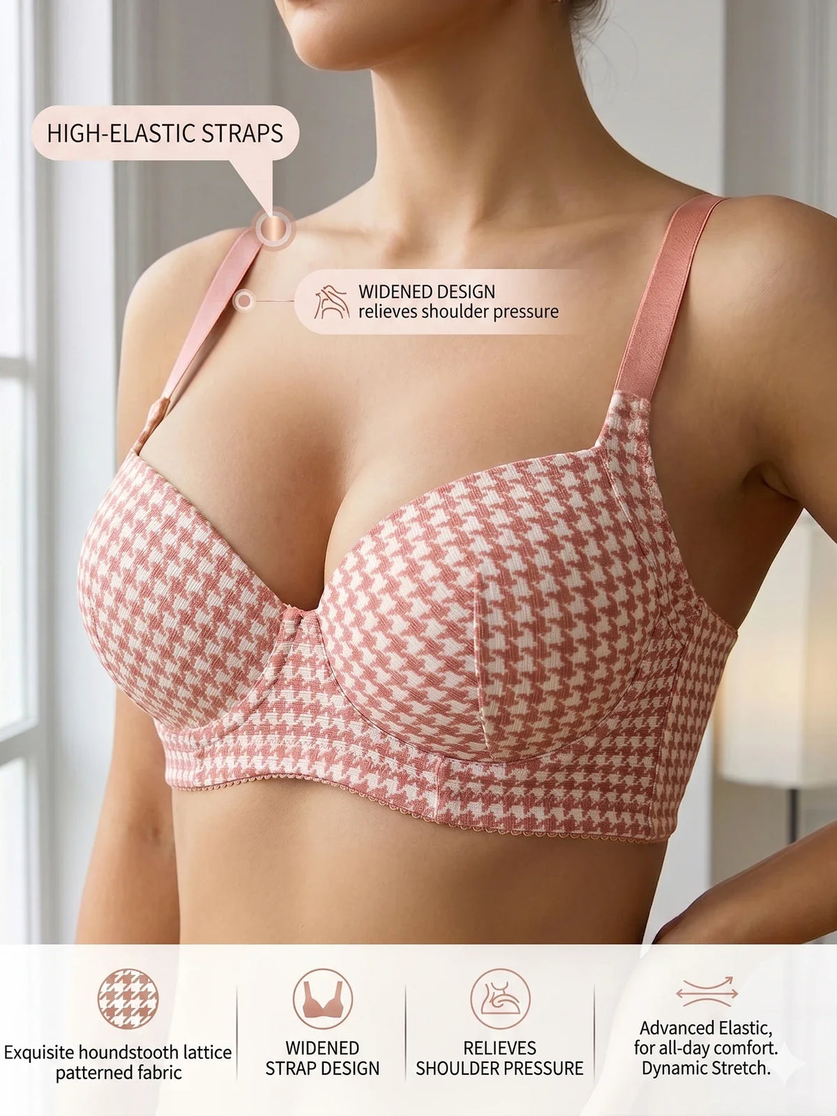 Pink houndstooth push-up bra with wide elastic straps and underwire, front view.
