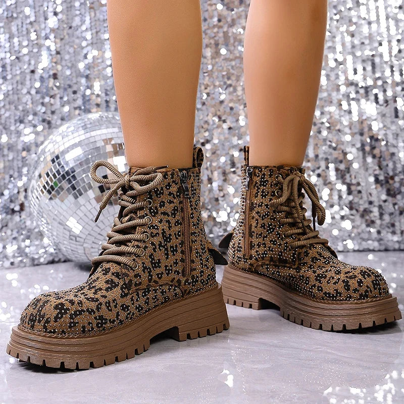 Brown leopard-print lace-up ankle boots with thick platform soles, front view