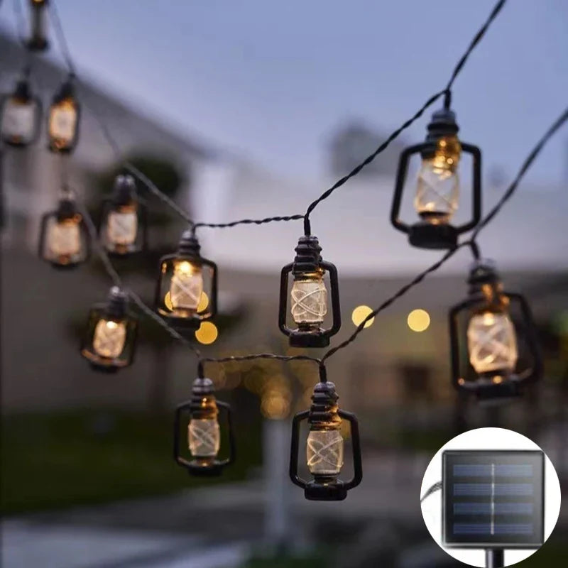 Solar lantern light string with bottle-shaped glass lamps and solar panel icon
