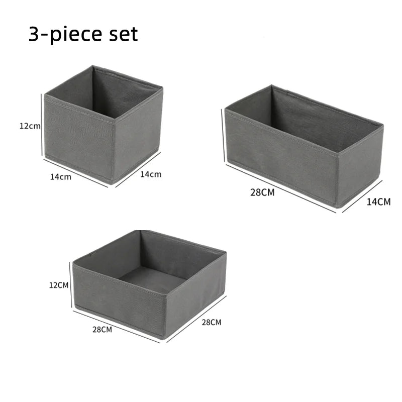 Gray foldable 3-piece storage bin set with different size compartments