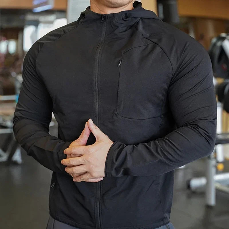 Men's nylon workout hoodie in black, full-zip front, attached hood, zip chest pocket