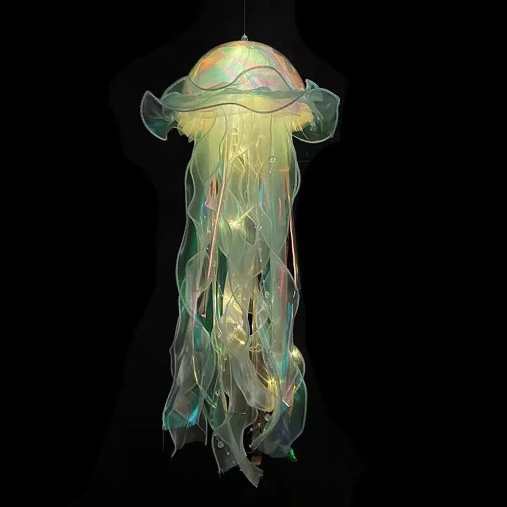 Jellyfish lantern hanging lamp with glowing teal and yellow tones over translucent body